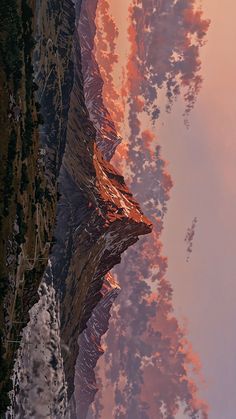 the sky is reflected in the water and trees are growing on the side of the mountain