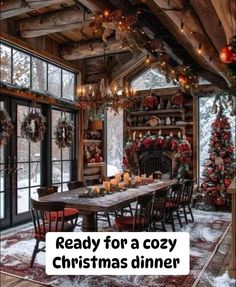 a cozy christmas dinner is ready for a cozy winter evening with candles and wreaths hanging from the ceiling