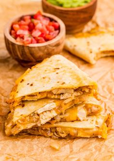 the quesadilla is cut in half and ready to be put into the dish