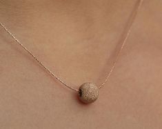 Gold ball necklace 14K Gold filled ball on a gold chain | Etsy Minimalist Rose Gold Necklace With Round Beads, Gold Ball Chain Necklace For Party, Rose Gold Necklace With Round Beads For Gift, Minimalist Rose Gold Necklaces With Round Beads, Minimalist Rose Gold Round Beads Necklace, Rose Gold Ball Chain Jewelry As A Gift, Rose Gold Ball Chain Necklace As Gift, Gold Long Necklace With Ball Chain, Rose Gold Ball Chain Necklace Gift