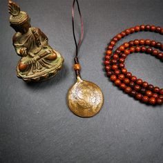 ❤This unique tibetan melong badge was handmade by Tibetan Artist from Baiyu County.It's a Astrology Protective Amulet Pendant,made of lima brass,the front pattern is Tibetan Budhist Protective Amulet Pendant - SIPAHO(srid pa ho),the back is imageof ritual conch,a bone carved dice bead in the middle of the lanyard.SIPAHO Melong Amulet on the cord,when on a go or travelling, it's placed as a waist badge.You can make it into pendant,keychain, bag hanging,or just put it on your desk,as an ornament.T Bohemian Brown Ceremonial Jewelry, Spiritual Carved Brass Jewelry, Traditional Brown Engraved Jewelry, Spiritual Bronze Jewelry For Meditation, Adjustable Antique Finish Spiritual Jewelry, Traditional Brown Brass Jewelry, Brass Amulet Jewelry For Meditation, Bronze Carved Spiritual Jewelry, Handmade Jewelry For Meditation And Festivals