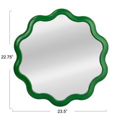 a green circular mirror with measurements for the frame and top edge, on a white background