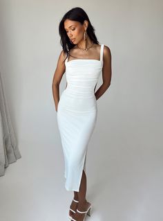 Midi dress Slim fitting 95% polyester 5% spandex Length of size US 4 / AU 8 shoulder to hem: 124cm / 48.8" Vivien is wearing a size US 4 / AU 8 Ribbed material Straight neckline Elasticated straps Lace-up back fastening Low back Elasticated ruching at waist High side slit Lined bust Graduation Dress College, White Dresses Graduation, Stylish Midi Dress, Midi Dress White, Dress Slim, Fleece Dress, Ribbed Dress, White Midi, Grad Dresses