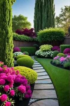 a garden with lots of flowers and trees