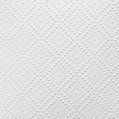 white textured paper with small dots on it