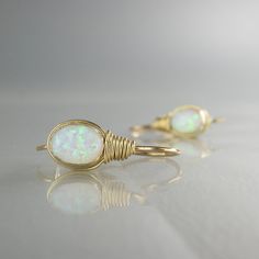 Gold Filled Opal Earrings Oval Opal Earrings White by yifatbareket Oval White Wire Wrapped Jewelry, White Oval Earrings With Ear Wire, Opal Earrings Dangle, Blue Opal Earrings, White Opal Earrings, Opal Drop Earrings, Jewelry Opal, White Lab, Ringe Gold