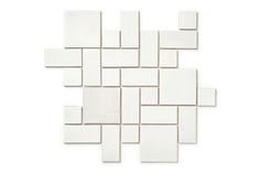 a white tile wall with squares on it