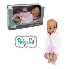 a baby's first doll and its packaging