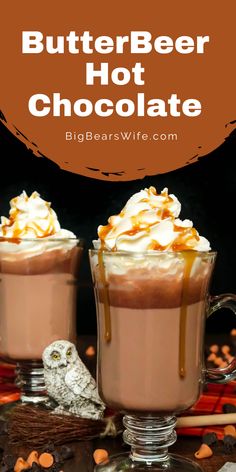 two mugs filled with hot chocolate and whipped cream