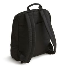 a black backpack sitting on top of a white floor