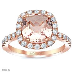 an oval cut morganite surrounded by white and rose gold diamond halos in the center