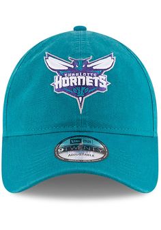 This Charlotte Hornets Teal Adjustable Hat features a front embroidered team logo on a lightly-structured cotton crown, with pre-curved visor and adjustable backstrap. Team logo embroidered on the front, Cloth Strap Closure to dial in the perfect fit, Relaxed, unstructured fit, Pre-curved bill, 100% cotton construction, New Era Flag logo on side, Dad hat, 100% Cotton, Washable, Imported Team-colored Cotton Hats With Curved Brim, Curved Bill Cotton Hat For Fan Merchandise, Cotton Curved Bill Hat For Fan Merchandise, Cotton Fan Merchandise Cap, Cotton Cap For Fan Merchandise, Curved Visor Cotton Hat For Fan Gear, Cotton Curved Visor Hat For Fan Gear, Team-colored Cotton Hat With Embroidered Logo, Cotton Hat With Team Logo For Sports Events