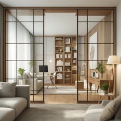 a living room filled with furniture and lots of glass doors that open up to the outside