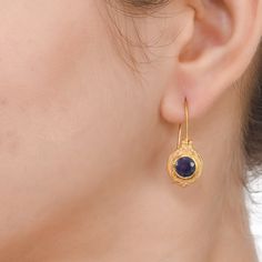 Blue Sapphire Vermeil 14K Gold Over Sterling Silver Earring 925 Silver = 4.65 gm. Blue Sapphire = 2.80 ct. Blue Sapphire is the birthstone for September and is a symbol of heaven. The beautiful earring measures to be 1.00 inches long including the wire and 0.50 inches wide at its maximum points. The earrings have been made by a team of highly trained and skilled artisans. What is Vermeil 14K Gold? It is a thick layer of 14K Gold plating on 925 Sterling Silver. If for any reason you are not compl Yellow Gold Sapphire Earrings Hallmarked, Hallmarked Sapphire Earrings In Yellow Gold, Hallmarked Yellow Gold Sapphire Earrings, Blue Tarnish-resistant Jewelry For Anniversary, Blue Gemstone Gold Plated Earrings, Yellow Gold Sapphire Round Earrings, Classic Sapphire Jewelry For Pierced Ears, Blue Round Stone Earrings For Gift, Gold-plated Sapphire Birthstone Jewelry