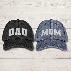 "If you're looking for a gift that's both unique and personal, look no further than the Mom & Dad Embroidered Dad Hat. This stylish cap is the perfect way to announce your pregnancy in style, and it also makes a great gift for new parents-to-be. The hat is made of high-quality materials, and features intricate varsity lettered embroidery work that reads \"Mom\" and \"Dad\". It's adjustable, so it can be worn by anyone, and its color scheme means it will go with any outfit. Whether you're looking Personalized Cotton Birthday Hat, Father's Day Gift Baseball Cap With Curved Brim, Letter Print Hat For Father's Day Gift, Father's Day Gift Hats With Letter Print, Curved Brim Baseball Cap For Father's Day, Letter Print Trucker Hat With Curved Brim, Letter Print Baseball Cap For Father's Day, Adjustable Baseball Cap For Father's Day Gift, Father's Day Gift Adjustable Baseball Cap