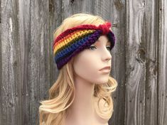 "Style: Crochet headband with top knot detail. Color: This sample headband is shown in Rainbow stripes. Sizes: One size fits 20\" to 23\" (50.5 cm to 58 cm) head size. Fiber Content: 100% acrylic Characteristics: Soft, light weight, fitted. Care Instructions: Hand wash, dry flat. Every item from Pixiebell is handmade and knit or crocheted to order, unless otherwise stated in title of the item as \"ready to ship\". Production time may vary, please check the SHIPPING & POLICIES tab for accurate processing times. If you need an item promptly, please contact us so that we can make arrangements. While every effort is made to accurately represent the true colors of the yarns used in our work, your monitor settings may affect the appearance of these colors on your screen. If you are interested in Crochet Head Wrap, Mens Headband, Summer Headband, Bandeau Au Crochet, Headband Summer, Womens Headband, Rainbow Headband, Summer Headbands, Headband Crochet