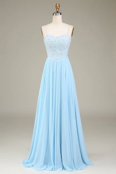 a light blue dress on a mannequin