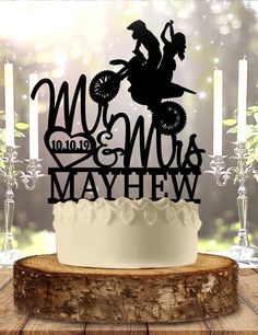 a cake topper that says motocross maybe