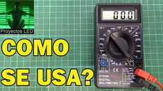 a digital multimeter sitting on top of a table with the words what is it?