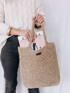 Casual, minimalistic bag with 100% natural jute twine. The bag is comfortable and practical, ideal for work, walks, the beach, for shopping.  It is ecological and natural, and will last a long time. * Minimalistic handbag. * Easy to care for. * Perfect for summer, autumn, winter and spring * Super strong  Perfect gift idea for her. Size : Height: 36cm (14,1 inches) Width 34cm (13.3 inches) Height with handles: 55 cm (21.6 inches) For the reason it is handmade, there might be a measurement differ Daily Handwoven Burlap Straw Bag, Lightweight Natural Crochet Bag For Daily Use, Everyday Handwoven Jute Bag, Daily Use Handwoven Burlap Straw Bag, Everyday Lightweight Natural Shoulder Bag, Natural Lightweight Everyday Shoulder Bag, Natural Burlap Tote Straw Bag, Handwoven Burlap Bags For Everyday Use, Handwoven Burlap Bag In Natural Color