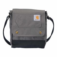 This cross-body bag gives you rugged storage for your day-to-day necessities. The large main compartment has smaller pockets to keep your gear in line, and it's spacious enough to hold a book or tablet. This bag is made with water-repellent material, so your things stay dry through light rain.Features600 denier polyester with Rain Defender® durable water repellentDimensions: 9" X 11" X 2.5"Large main compartment with flap over snap closureFour interior pocketsAdjustable cross body shoulder strap Snap Bag, Carhartt Womens, Carhartt Women, Water Repellent Fabric, Waist Pack, Snap Closure, Inside Pocket, Backpack Bags, Workout Shirts