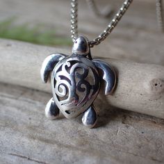 "This is a very beautiful turtle necklace. It measures 1/2\" long from the top of the jump ring, 1/2\" wide and is solid sterling silver.  The turtle symbolizes many things. Most of us know the story of the tortoise and the hare, reminding us that slow and steady wins the race. The turtle also symbolizes the earth, staying grounded, wisdom and emotional strength.   An interesting fact about turtles is that they have been on earth for more than 200 million years. The earliest turtles had teeth and couldn't retract into their shells. Besides these few exceptions modern day turtles are very similar to their early ancestors. As they say, if it ain't broke don't fix it!" The Tortoise And The Hare, Turtle Facts, Tortoise And The Hare, Staying Grounded, Slow And Steady, Turtle Charm, Turtle Necklace, Silver Chain Style, The Race