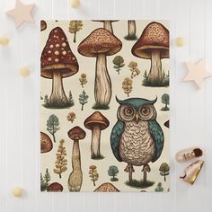 an owl and mushrooms pattern on a white background