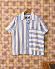 The Turing short sleeve shirt is cut in a lightweight David Hicks-esque pink and orange striped cotton. With a delicately woven stripe design and a relaxed fit, the Turing shirt features the signature contrast stripe integrated patch pocket and burgundy embroidered logo on the chest. A perfect summer shirt.    Made in Portugal 100% Cotton Embroidered logo above chest pocket Short-sleeve Boxy fit Pink and Orange Ss24 Menswear, David Hicks, Pant Style, Shorts With Pockets, Stripes Design, Resort Wear, Perfect Summer, Fashion Pants, Chest Pocket