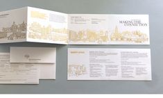 an opened brochure and two envelopes on top of each other with information about the city