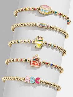 Ace your back to school style with the Hit The Books Kids' Pisa Bracelet Set. Each of the five bracelets is adorned with fun school supplies and themed pendants, like pencils, rulers, ABCs and more. Mix and match to create the cutest wrist stack, or share with friends to start the school year off with a smile. Please note: intended for children 3+ Fun School Supplies, Smile Please, Justice Accessories, Wrist Stack, Fun School, Wrist Stacks, Cool School Supplies, Baublebar Jewelry, School Jewelry