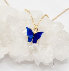 Elegant Blue Butterfly Charm Necklace, Elegant Blue Butterfly Necklace With Charm, Dainty Blue Butterfly Jewelry, Blue Butterfly Necklace For Gifts, Blue Butterfly Necklace For Gift, Blue Jewelry With Butterfly Charm For Jewelry Making, Blue Butterfly Necklace, Butterfly Necklaces, Tiny Butterfly