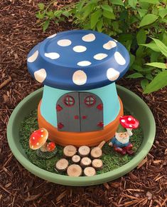 there is a small mushroom house in the garden