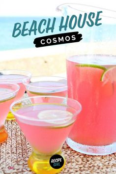 beach house cosmos in glasses and pitcher Beach House Cosmos, Beach House Dinners, Beach House Recipes, Pitcher Cosmopolitan, Beach House Food, Cosmos Recipe, Beach Drink Recipes, Cosmopolitan Drink Recipe, Cosmo Drink