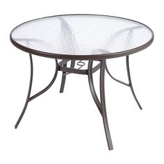 an outdoor table with glass top and metal frame, against a white background or backdrop