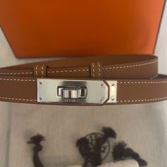 Very Hard To Find Kelly 18 Belt In Color Gold With Palladium-Plated Kelly Buckle New With All Original Packaging Dreamy Accessories, 2025 Goals, Gold Belt Buckle, Hermes Belt, Silver Belt Buckle, Hermes Accessories, Gold Belts, Silver Belts, Silver Engraving