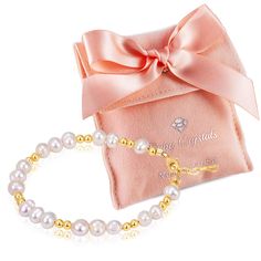 PRICES MAY VARY. EXCEPTIONAL QUALITY: 14K Gold Plated Bracelet for Girls embellished with Cultured Fresh Water Pearls. Hand crafted by artisan jewelers in the USA. BABY GIRL GIFTS: The perfect Baby Jewelry for Infant Girls for a Baby Shower Gift for a Granddaughter, Goddaughter, Niece or little sister Baptism, christening, Baby keepsake Bracelet STYLISH & ELEGANT: Our Baby Bracelets for infant Girls features a selection of styles, each Baby Bracelet elegantly packaged in a pretty pink gift Pouch 14k Gold Plated Jewelry, Toddler Bracelet, Toddler Girl Gifts, Baby Bracelet, Baby Jewelry, Baby Keepsake, Gold Plated Bracelets, Freshwater Cultured Pearls, Birthday Gifts For Girls