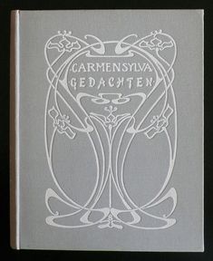 the front cover of a book with an ornamental design