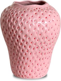 a pink ceramic vase with red dots on the top and bottom, sitting in front of a white background