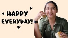 a woman holding a sandwich in front of her face with the words happy everyday on it