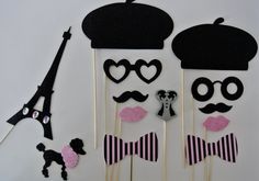 the cake toppers are made to look like they have mustaches and bow ties