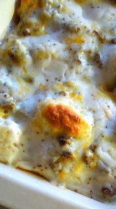 a casserole dish with eggs and cheese in it