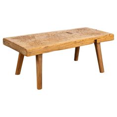 an old wooden bench sitting on top of a white background