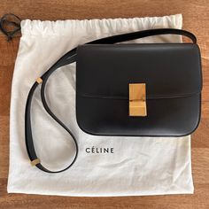 Authentic Celine Medium Classic Bag In Box Calfskin Original Price $3,950 + Tax = $4,300. Pre-Loved In Good Condition With Minor Wear. Comes With Dust Bag But Unfortunately The Dust Bag Is Stained During The Move - Bag Was Carried Separately. So I’m Letting It Go With The Price Listed! *Price Negotiable - Serious Inquiries Only Please Letting It Go, Celine Bags, Classic Bags, Calf Skin, Dust Bag, Bag Lady, Shoulder Bag, Black