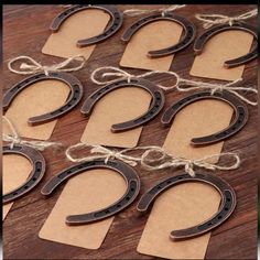 wooden cutout numbers tied with twine on top of a wood tablecloth covered table