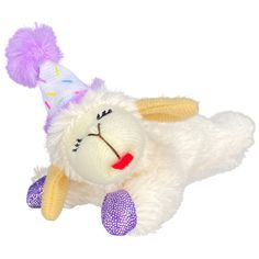 a white stuffed animal with a party hat on it's head and ears laying down