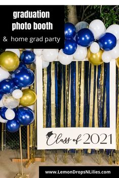 graduation photo booth with balloons and streamers in blue, gold and white color scheme