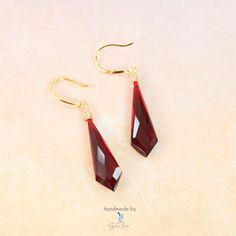 Experience the elevated style of our Kite red garnet natural stone drop earrings. These handcrafted earrings feature genuine garnet stones in a kite shape, bringing sophistication and energy to any outfit. The translucent red stones are known for increasing passion and vitality, making them an ideal gift for yourself or a loved one. Elevate your fine jewelry collection with these one-of-a-kind kite red garnet dangle earrings. You can choose metal finish options: Silver: will have solid 925 sterl Stone Drop Earrings, Red Stones, Gem Earrings, Elevated Style, Garnet Earrings, Garnet Stone, Unique Diamonds, Handcrafted Earrings, Fine Jewelry Collection