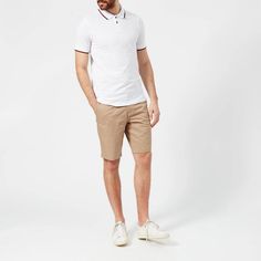 Men's short sleeve polo shirt from Armani Exchange. Crafted from durable cotton, the top features a classic tipped collar, two button placket and short sleeves with coordinating tipped cuffs. Complete with a small A|X logo to the chest. Vented side hems..100% Cotton.Model is 188cm/6'2' and wears a size M. Fitted Polo Shirt With Contrast Collar, Fitted Short Sleeve Polo Shirt With Contrast Collar, Summer Polo Shirt With Contrast Collar And Short Sleeves, Casual Cotton Polo Shirt With Contrast Collar, Classic Polo Shirt With Contrast Collar For Summer, Casual Cotton Polo Shirt With Contrast Trim, Summer Polo Shirt With Contrast Trim, Cotton T-shirt With Polo Contrast Collar, White Cotton Polo Shirt With Contrast Trim