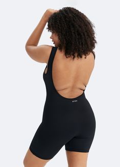 Sculpt and smooth with our Waist-Contouring Bodysuit. Designed to enhance your natural shape, this bodysuit provides gentle compression for a flattering fit in standard and plus size options. Whether layered or worn on its own, it’s the perfect mix of style and support. Stretch Bodysuit With Built-in Padding, Sports Bodysuit With Low Back And Fitted Design, Compression Smoothing Bodysuit For Workout, Fitted Sports Bodysuit With Moderate Back Coverage, Compressive Shapewear Bodysuit For Yoga, Compressive Seamless Bodysuit For Pilates, Compressive Shapewear Swimwear For Yoga, Black Stretch Bodysuit With Closed Back, Black Stretch Leotard With Low Back