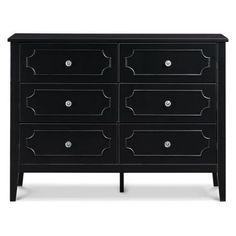 a black dresser with drawers and knobs on the top, in front of a white background